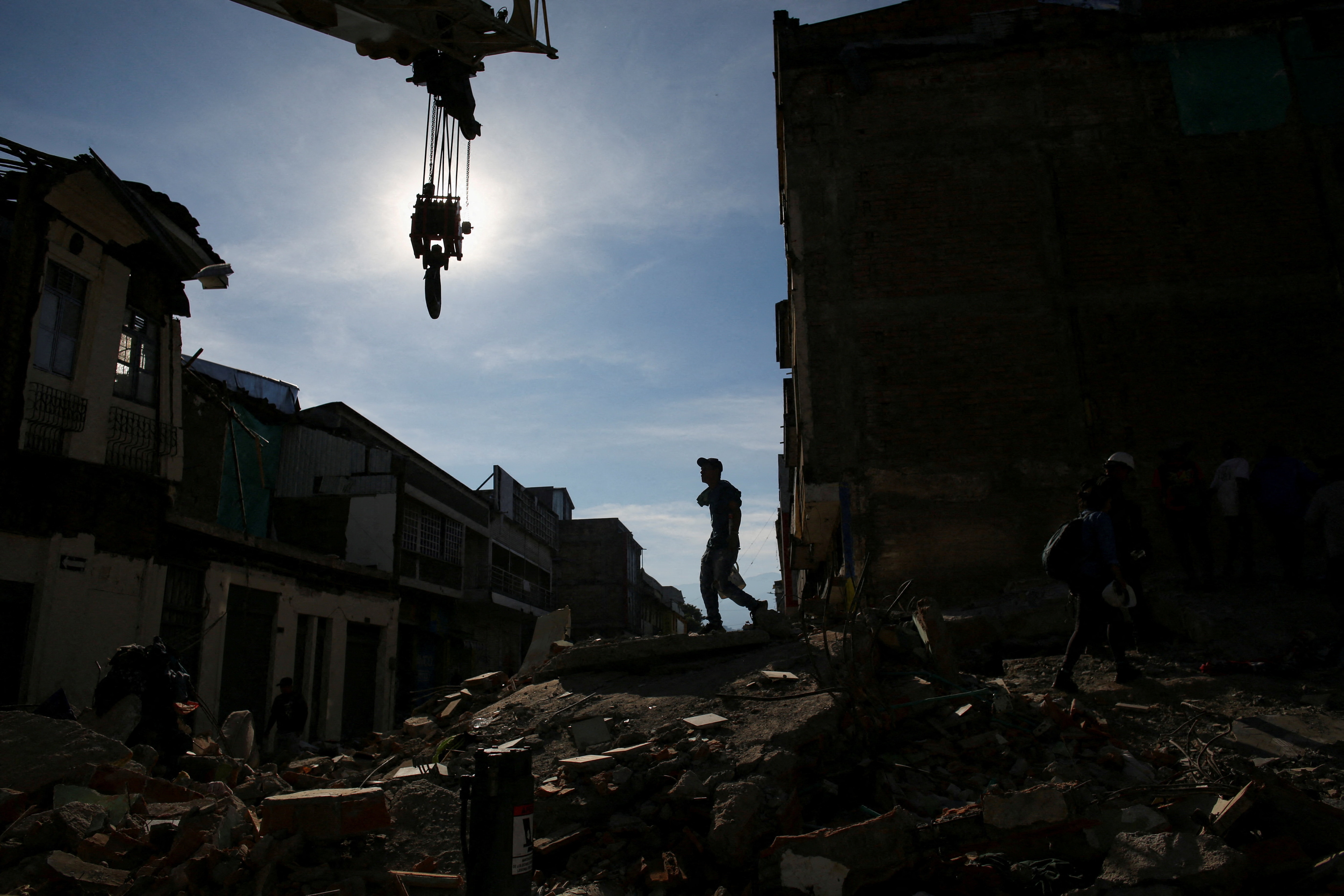 Emergency personnel work at the site of a damaged building following an earthquake in Pereira, Colombia, August 11, 2026. (REUTERS)