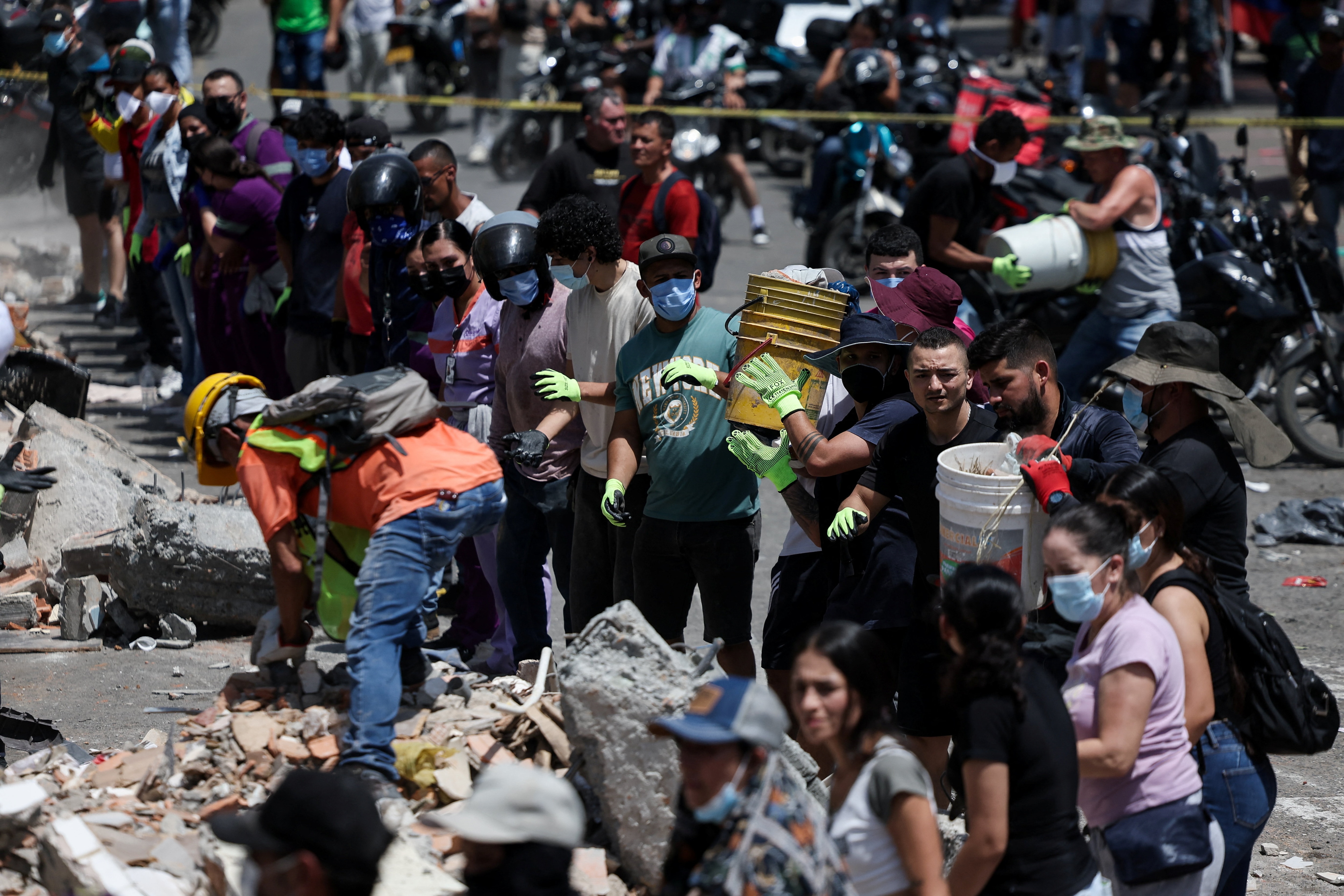 Rescuers remove rubble as they search for survivors at the site of a collapsed building, following an earthquake, in Pereira, Colombia, August 11, 2026. (REUTERS)