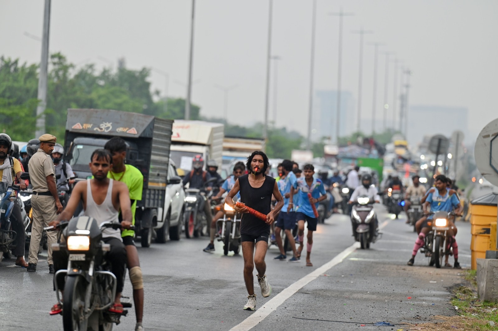 Vehicles move on the Delhi-Gurugram Expressway amid the Daak Kanwar Yatra ahead of Shivratri on Monday, August 10 (Parveen Kumar/Hindustan Times) Vehicles move on the Delhi-Gurugram Expressway amid the Daak Kanwar Yatra ahead of Shivratri on Monday, August 10 (Parveen Kumar/Hindustan Times)
