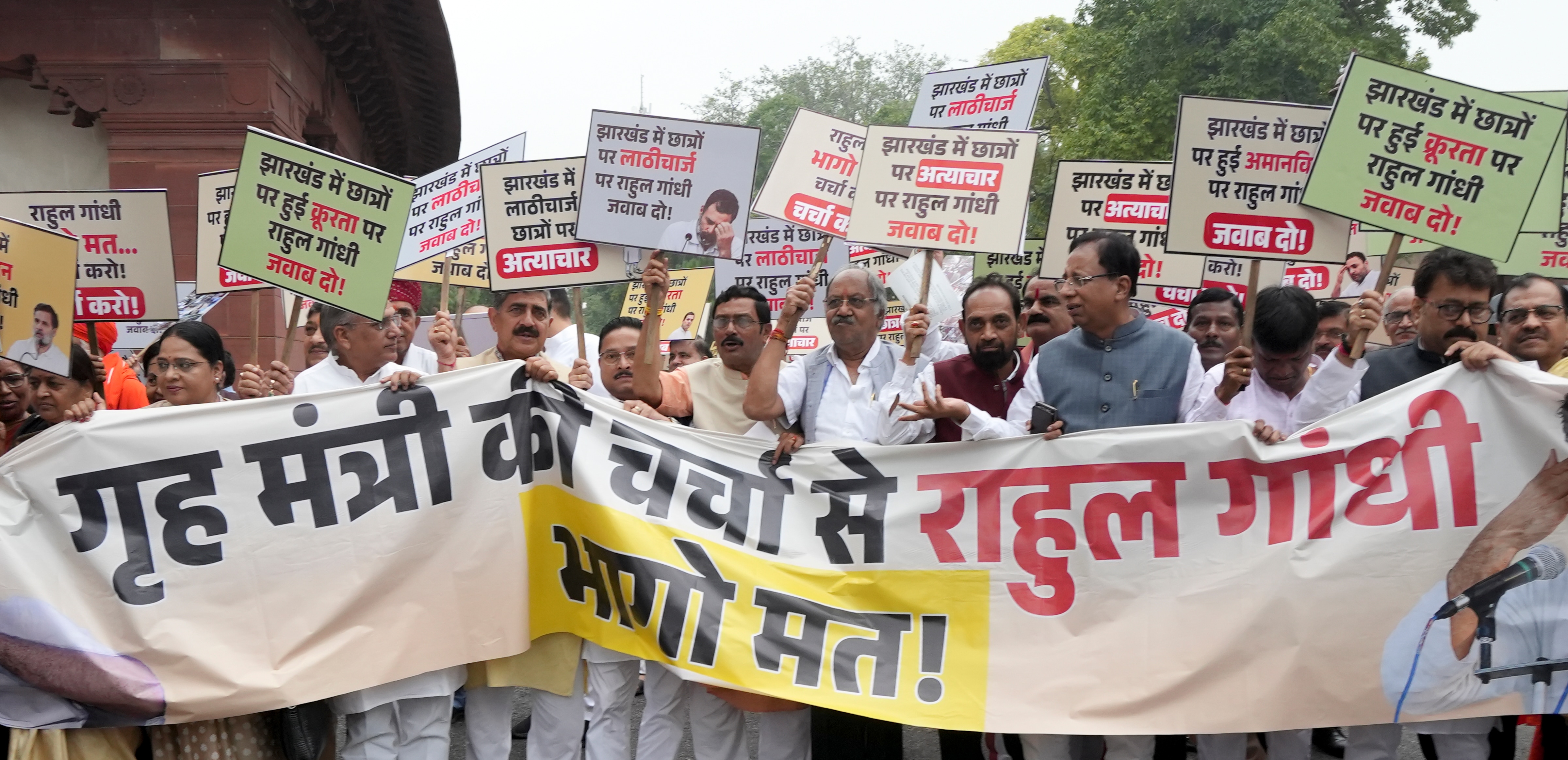 Ruling NDA MPs stage a protest against the police action on job aspirants in Jharkhand and also against LoP in Lok Sabha Rahul Gandhi for allegedly avoiding a debate on student protests in different parts of the country, (PTI) Ruling NDA MPs stage a protest against the police action on job aspirants in Jharkhand and also against LoP in Lok Sabha Rahul Gandhi for allegedly avoiding a debate on student protests in different parts of the country, (PTI)