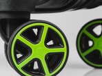 Four-wheel or two-wheel luggage? Real travel experience reveals which suitcase works best across airports, city streets and rough terrain.(canva.com)