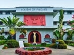 BJP workers repainted Kolkata’s Academy of Fine Arts ticket counter saffron, a day after theatre personalities painted over the colour with white.
