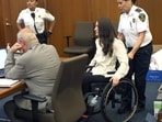 Lindsay Clancy enters the courtroom after a short break in her murder trial at Plymouth Superior Court in Plymouth, Mass., Wednesday, Aug. 5, 2026. (David L Ryan/The Boston Globe via AP, Pool) CORRECTION: Source is The Boston Globe, not The Boston Herald.