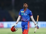 Delhi Capitals Abishek Porel walks off after losing his wicket to the bowling of Rajasthan Royals' Brijesh Sharma