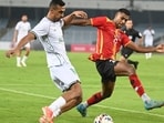 Jay Gupta (R), who scored the 90th minute equaliser to inspire East Bengal to a comeback win, vies for the ball with Khaled of Kuwait’s Al Arabi SC in the AFC Champions League 2 qualifier at Salt Lake Stadium in Kolkata on Wednesday. (Samir Jana/HT Photo)