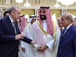 Turkey's President Recep Tayyip Erdogan (left), Saudi Arabia Crown Prince Mohammed bin Salman and Pakistan Prime Minister Shehbaz Sharif meeting in Mecca.(AFP)