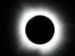The internet buzzes over a theory predicting Earth's gravity loss on August 12, 2026, lasting seven seconds, linked to black hole collisions. NASA refutes the claim, explaining gravity's reliance on mass and emphasizing that gravitational waves are undetectable at significant levels.(AP Photo/Julio Cortez)