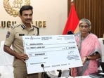 Telangana DGP CV Anand presents a reward cheque to Kakarala Samatha at an event in Hyderabad on Tuesday. (HT PHOTO) Telangana DGP CV Anand presents a reward cheque to Kakarala Samatha at an event in Hyderabad on Tuesday. (HT PHOTO)
