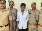 The accused in police custody. (Sourced)
