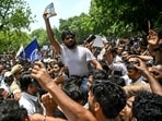 File photo: Cockroach Janta Party (CJP) founder Abhijeet Dipke (C) during the protest over alleged irregularities at Jantar Mantar
