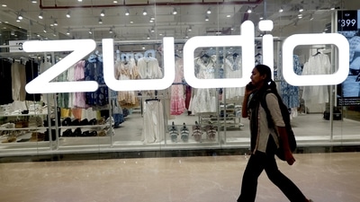 FILE PHOTO: A woman passes in front of the Indian fashion retailer Trent's flagship brand Zudio showroom in New Delhi, India, April 8, 2025. REUTERS/Priyanshu Singh/File Photo (REUTERS)
