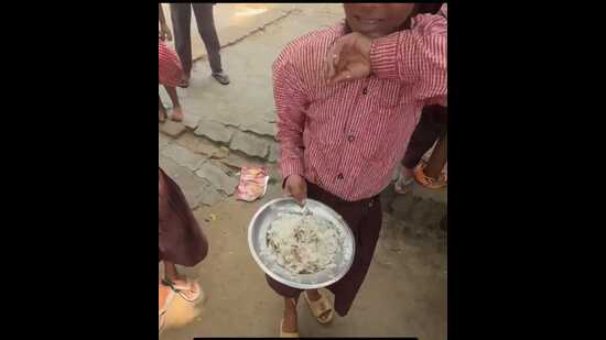 A clip from a video that went viral shows the food being served at Primary School Kotra in Tadiyawan development block of Hardoi. (Sourced)