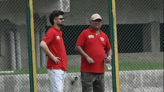 Skipper Sameer Rizvi (left) and team mentor Gyanendra pandey (right) ahead of a training session in Lucknow. (Deepak Gupta/HT Photo)