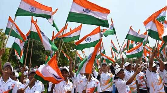 Students participated in the ‘Tiranga Yatra’ at Kartavya Path in New Delhi on Wednesday. (Vipin Kumar/HT PHOTO)