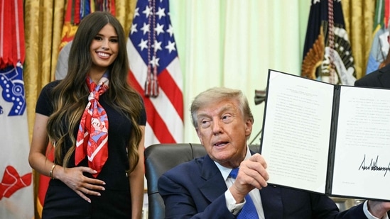 Jayme Franklin, former Trump staffer and CEO of The Conservateur, responds to absurd theories about her nodding at a vaccine announcement, revealing she is pregnant.(AFP)