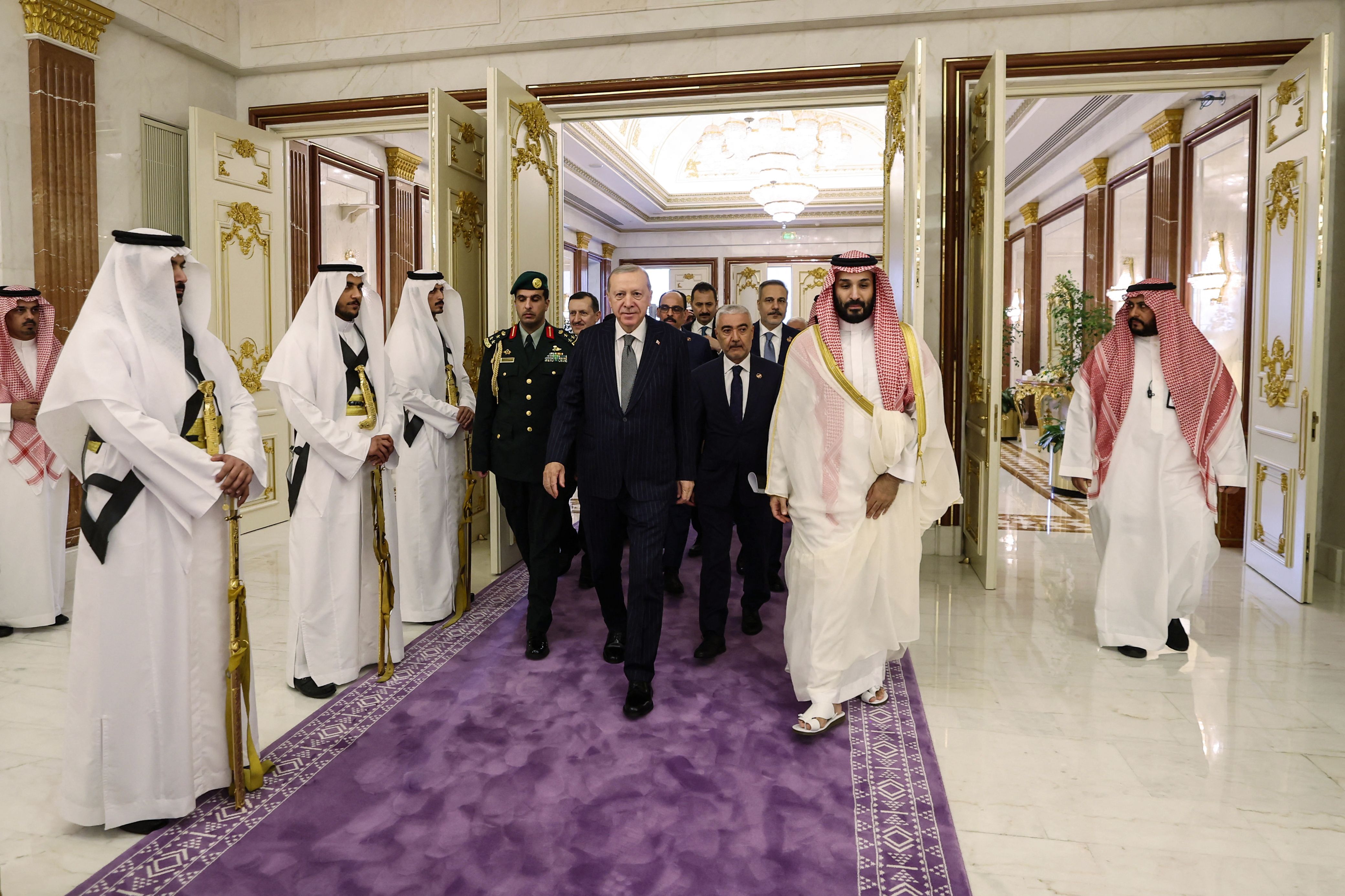 Saudi Arabia's Crown Prince Mohammed bin Salman (C-R) walking alongside Turkey's President Recep Tayyip Erdogan (C) during their meeting in Mecca. Saudi Arabia, Turkey and Pakistan signed a joint defence agreement on August 7. (AFP) Saudi Arabia's Crown Prince Mohammed bin Salman (C-R) walking alongside Turkey's President Recep Tayyip Erdogan (C) during their meeting in Mecca. Saudi Arabia, Turkey and Pakistan signed a joint defence agreement on August 7. (AFP)