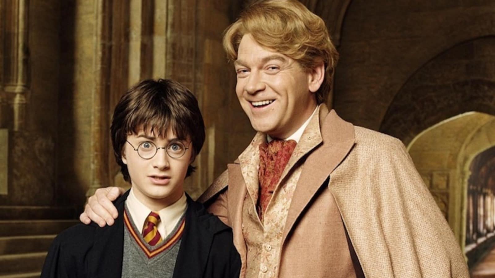 Kenneth Branagh as Lockhart with Daniel Radcliffe's Harry Potter in the film adaptation. Kenneth Branagh as Lockhart with Daniel Radcliffe's Harry Potter in the film adaptation.