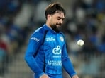 Afghanistan's Rashid Khan tosses the ball in the air as he prepares to bowl during the third ODI cricket match between Afghanistan and India in Chennai, India, Saturday, June 20, 2026. (AP Photo/Mahesh Kumar A.) (AP Photo/Mahesh Kumar A.)