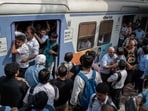Passengers gather to board a crowded train. (Representational image).  
