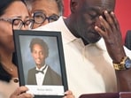 Elmore Wonsley, right, pauses from speaking as wife Christine Wonsley holds a photo of her deceased son, Nolan Wells, as they appear at the National Urban League's annual conference, Thursday, July 30, 2026, in Nashville, Tenn. (AP Photo/John Amis)(AP Photo/John Amis)