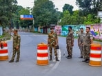 Security personnel stand guard near a road blocked amid security concerns, amid the ongoing protest by students and aspirants demanding a probe into alleged recruitment exam irregularities conducted by the JPSC and JSSC, near Jharkhand Chief Minister Hemant Soren's residence, in Ranchi, Jharkhand, Thursday, Aug. 13, 2026.