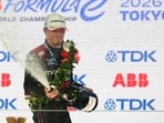 Race winner Nyck de Vries of the Netherlands and Mahindra Racing sprays champagne on the podium after the Tokyo E-Prix, Round 15 of the 2026 FIA Formula E World Championship at Tokyo Street Circuit on July 26, 2026 in Tokyo, Japan. (LAT Images)