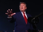 President Donald Trump talks to reporters after arriving on Air Force One Tuesday, Aug. 11, 2026, at Joint Base Andrews, Md. (AP Photo/Mark Schiefelbein)