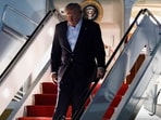 US President Donald Trump arrives aboard the new Qatari-gifted Air Force One, as he returns to Washington after participating in a NATO leaders' summit in Turkey, at Joint Base Andrews, Maryland, US.