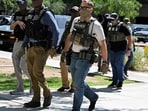 ICE agent pulls gun after Virginia woman confronts officers. 