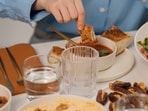 Eating with the hands helps improve the sensory experience. Eating with the hands helps improve the sensory experience.