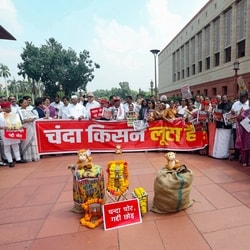 Opposition MPs stage a protest against the alleged theft of Ram Temple donations, at Parliament premises in New Delhi on Thursday. 