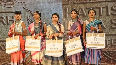 Surrendered women naxals pose for a group picture during their participation in a Tribal fashion show programme organised to mark National Handloom Day, in Raipur. (ANI Photo) Surrendered women naxals pose for a group picture during their participation in a Tribal fashion show programme organised to mark National Handloom Day, in Raipur. (ANI Photo)