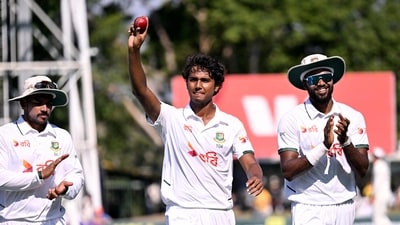Bangladesh bowler Hasan Mahmud (C) holds the ball aloft after taking six wickets against Australia. (AFP) Bangladesh bowler Hasan Mahmud (C) holds the ball aloft after taking six wickets against Australia. (AFP)