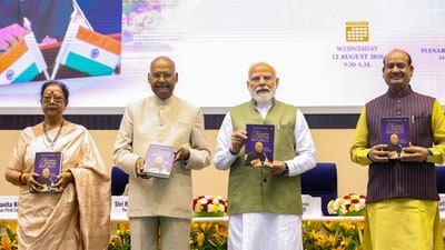 Prime Minister Narendra Modi with former president Ram Nath Kovind, Lok Sabha Speaker Om Birla, and others, during the launch of Kovind's autobiography, 'Triumph of the Indian Republic: My Life, My Struggles.' (PMO)