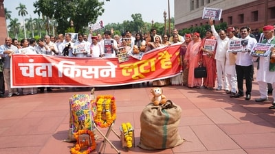 Opposition MPs protest alleged theft of Ram Temple donations at Parliament complex. (PTI) Opposition MPs protest alleged theft of Ram Temple donations at Parliament complex. (PTI)