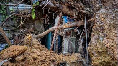 Rescuers used their bare hands and other manual means to find survivors and victims while simultaneously clearing the debris (Hindustan Times) Rescuers used their bare hands and other manual means to find survivors and victims while simultaneously clearing the debris (Hindustan Times)