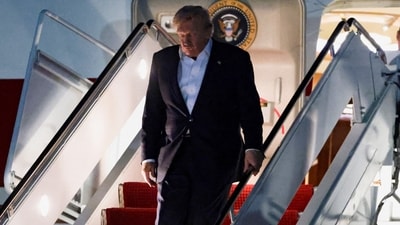 US President Donald Trump arrives aboard the new Qatari-gifted Air Force One, as he returns to Washington after participating in a NATO leaders' summit in Turkey, at Joint Base Andrews, Maryland, US. (REUTERS)