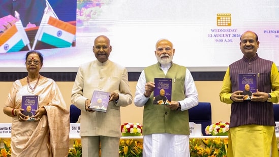 Prime Minister Narendra Modi with former president Ram Nath Kovind, Lok Sabha Speaker Om Birla, and others, during the launch of Kovind's autobiography, 'Triumph of the Indian Republic: My Life, My Struggles.' (PMO)