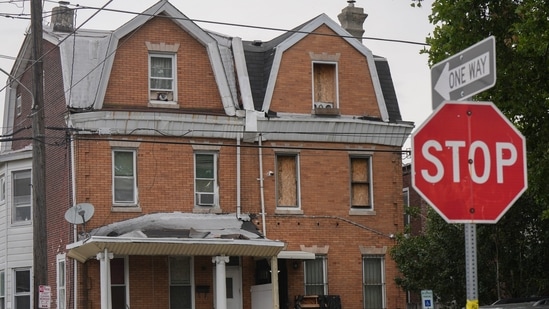 Investigators search a home in the Olney section of Philadelphia, Friday, June 26, 2026. (Jessica Griffin/The Philadelphia Inquirer via AP) (Jessica Griffin/The Philadelphia)