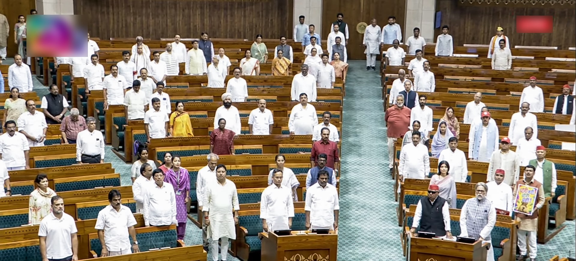 Lok Sabha MPs stand for 'Vande Mataram' in the House on Thursday. (Sansad TV) Lok Sabha MPs stand for 'Vande Mataram' in the House on Thursday. (Sansad TV)