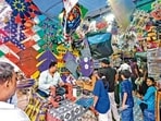 Shoppers throng the vibrant aisles of Lal Kuan to eagerly pick out their favourite colourful kites for flying. Shoppers throng the vibrant aisles of Lal Kuan to eagerly pick out their favourite colourful kites for flying.