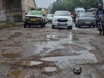 Damaged road conditions in Sherpur area in Ludhiana on Friday. (Gurpreet Singh/Hindustan Times)