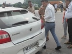 Following this, some drivers were attempting to pass through the toll plaza by tampering with their vehicle number plates to avoid paying toll fees. (HT Photo)