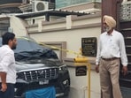 Police investigate the crime scene after firing was reported outside the residence of former Akal Takht Jathedar Giani Raghbir Singh in Amritsar on Friday.