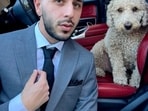 Brawardis and his late dog Booker(Brawardis | X)