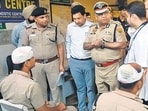 Haryana police officials meeting injured cops in Ambala on Thursday. (HT Photo)