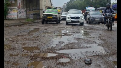 Damaged road conditions in Sherpur area in Ludhiana on Friday. (Gurpreet Singh/Hindustan Times) Damaged road conditions in Sherpur area in Ludhiana on Friday. (Gurpreet Singh/Hindustan Times)