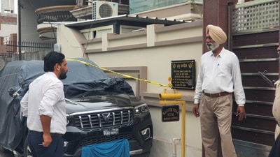 Police investigate the crime scene after firing was reported outside the residence of former Akal Takht Jathedar Giani Raghbir Singh in Amritsar on Friday. (HT photo) Police investigate the crime scene after firing was reported outside the residence of former Akal Takht Jathedar Giani Raghbir Singh in Amritsar on Friday. (HT photo)