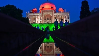 Gram it: As India celebrates its 80th Independence Day, the Tricolour-themed lighting is glowing up Delhi's landmark buildings in the true spirit of patriotism. Here's a scenic view of the Humayun's Tomb, on Mathura Road, as it gets illuminated in hues of saffron, white and green, (Photo: Sanchit Khanna/HT)