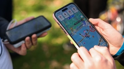 People play the Pokemon GO game on smartphones during the in-person Pokemon GO Tour. (AFP/ File Photo) People play the Pokemon GO game on smartphones during the in-person Pokemon GO Tour. (AFP/ File Photo)